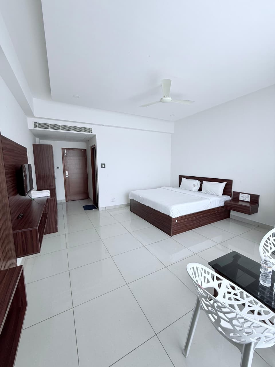 Comfortable bedroom at Vintage BAK Holidays Mysore